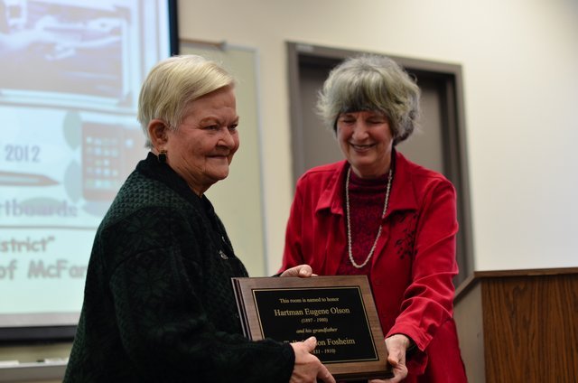 Tura Olson Graber received the plaque that will go in the room in the Larson House that she named after her father, Hartman Olson and her great grandfather, Tollef Olson.  More photos of the Annual Meeting.